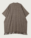 SILENT handwoven yak wool poncho flat lay, back view, warm brown tone with hand-knotted fringe hem — Traces of the World
