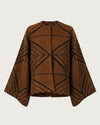 ARAÑA handwoven brocaded jacket flat lay, front view, burnt sienna and black geometric spider web pattern, wide sleeves — Traces of the World

