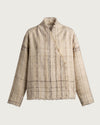 DESI handwoven wool jacket flat lay, front view, natural ecru with vertical stripe texture, frayed hem and wrap collar — Traces of the World
