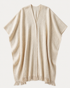 HIGHLAND handwoven yak wool poncho flat lay, front view, natural ivory with V-neckline and hand-knotted fringe hem — Traces of the World