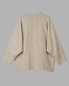 Rear view of the Kala jacket alone, highlighting the natural texture and sustainable craftsmanship of the Kutch weavers. 