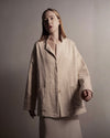 front view of the Sofia jacket, emphasizing sthe clean architectural lines and the thick, soft organic cotton fabric. 