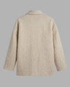 Rear view of the Sofia jacket solo, highlighting the high-quality craftsmanship and hand-spun cotton weave. 
